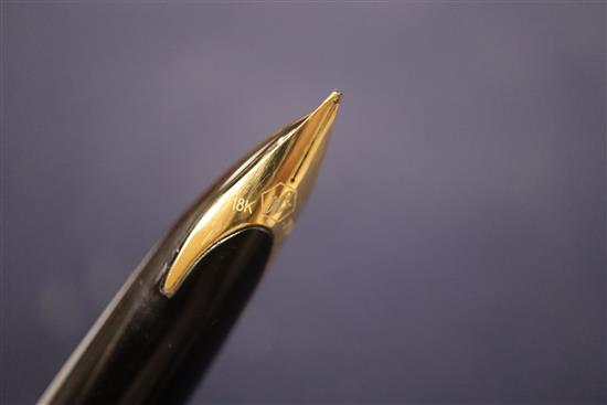 A group of five vintage fountain pens, including a Watermans orange and black marble effect pen